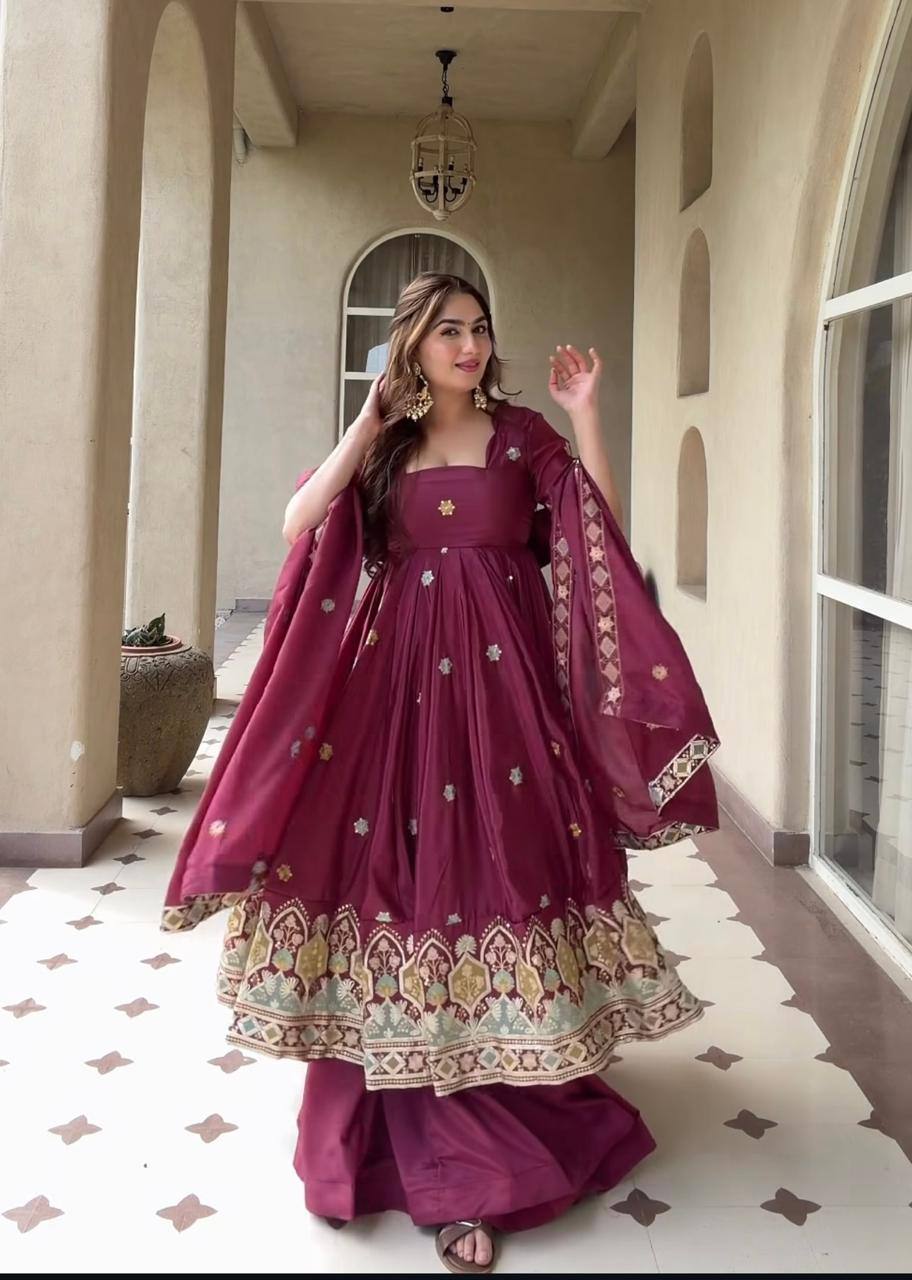 Majestic Wine Flared Anarkali Suit Set Adorned with Delicate Floral Scattered Motifs and an Ornate Heritage Embroidered Border